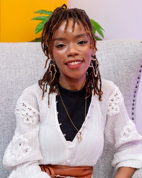 Portrait of Lizzy Githua, head journalist and editor of GGND.
